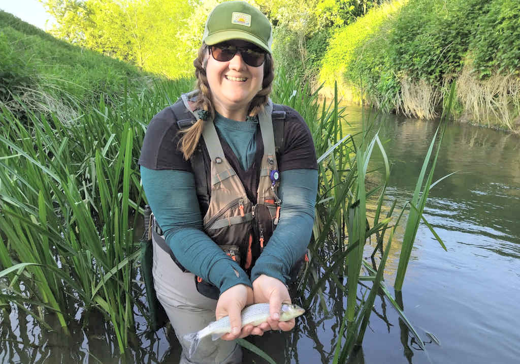 Photo of Jen with her first grayling